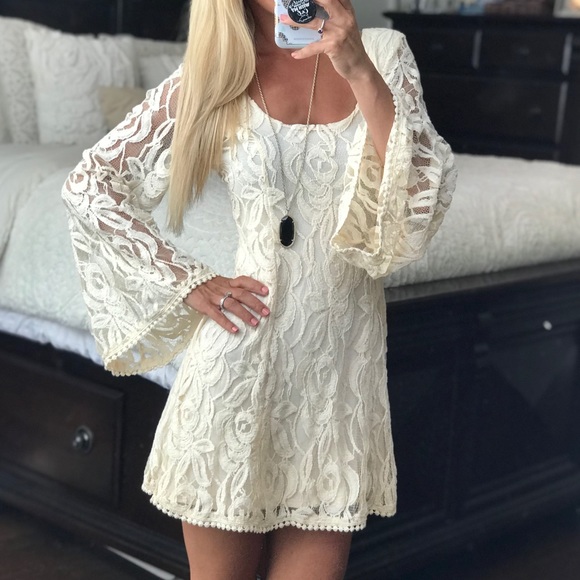 Urban Outfitters Dresses & Skirts - ❗️SOLD❗️Staring at Stars White Bell Sleeve Dress